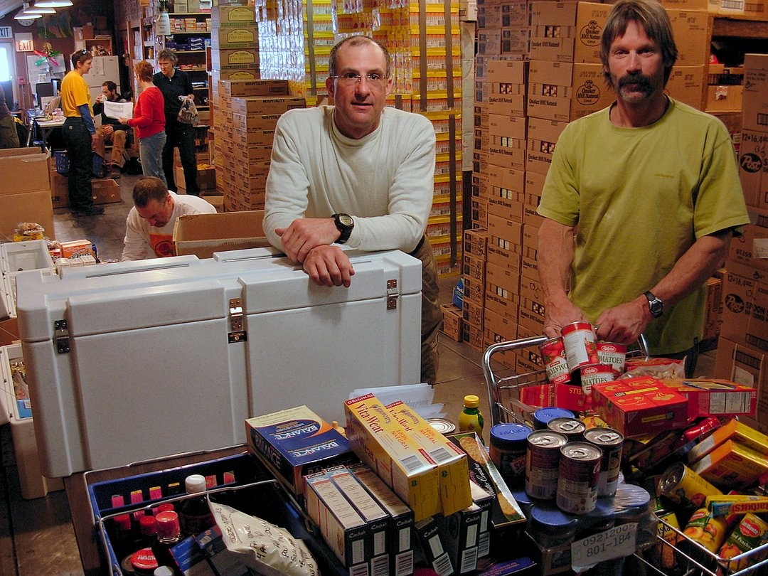 I am packing food (left) with expedition team member Cliff Leight (right) for our six weeks of camping in the Antarctic interior.