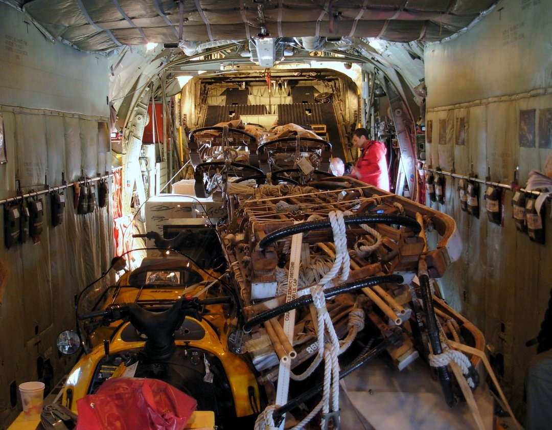 Loading our gear in the cargo bay of the C-130.  It takes 8 tons of stuff to keep eight humans alive and well in the Antarctic interior for six weeks.  Similarly, it takes tons of supplies to keep humans alive in space.  The simple weight of the air contained by Space Station is over a ton.  And unlike on Earth, in space, you have to bring your own air to breath.