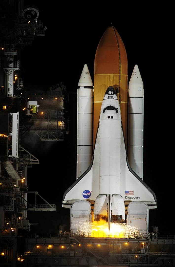 Meanwhile, the Space Shuttle Discovery, STS-116, was launching on its mission.