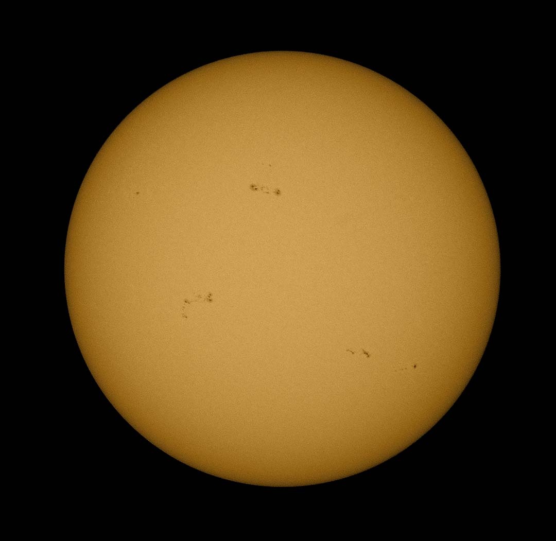 A practice image of the sun in preparation for the transit of Venus; the sun has brown spots like Sunflower’s leaves.  I wonder if it needs a treatment for brown patch.