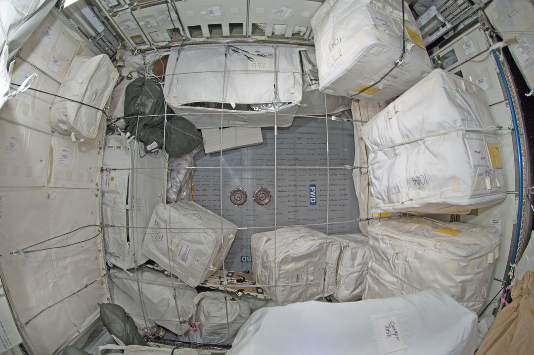 A bungee jail; we quickly stored bags behind this network of bungee cords until their final location could be sorted out.